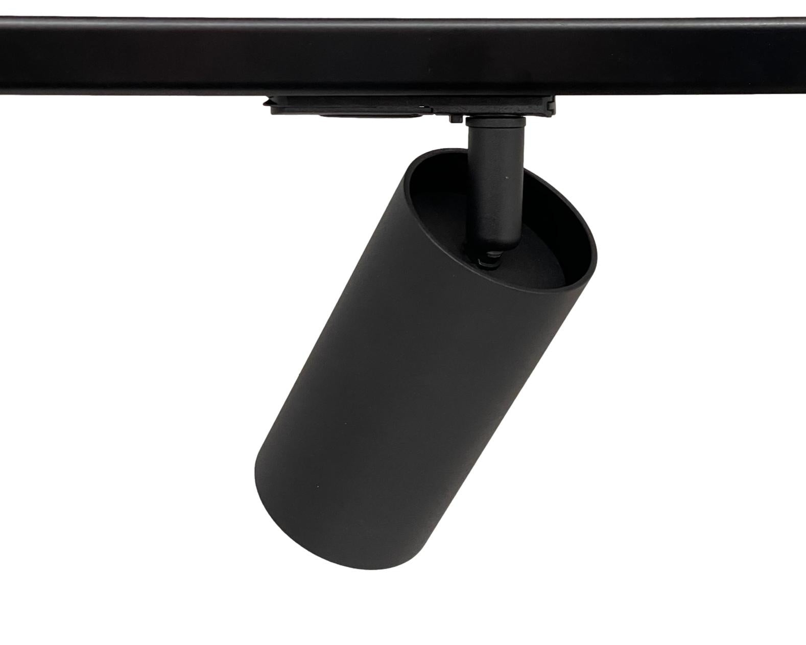 zwarte 1-fase railverlichting met GU10 spots waarbij de lichtbron verdiept ligt tegen inkijk